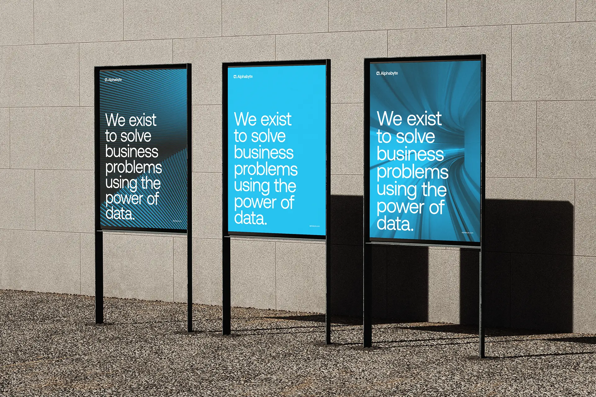 three posters outdoors