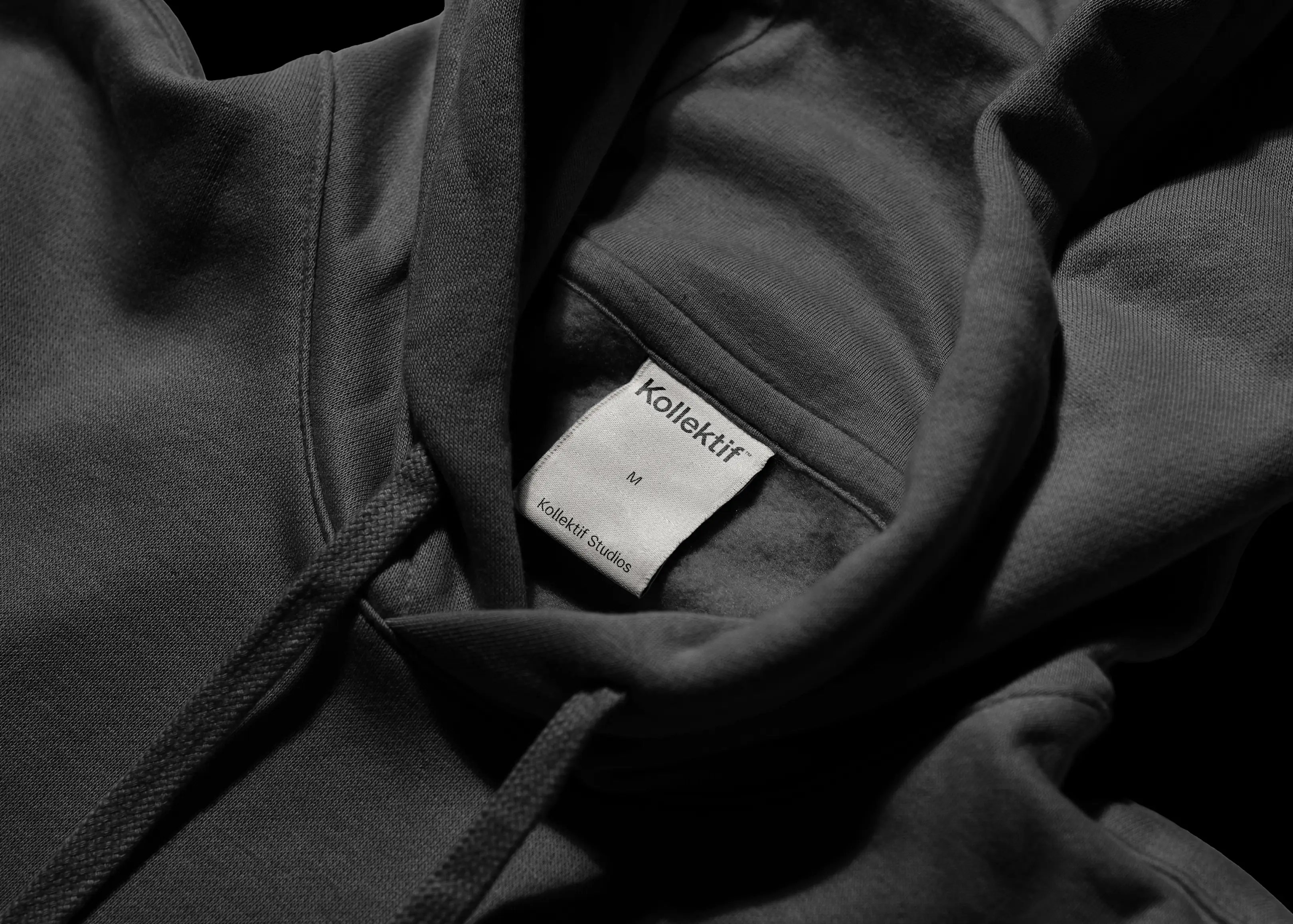 kollektif tage in black hoodie