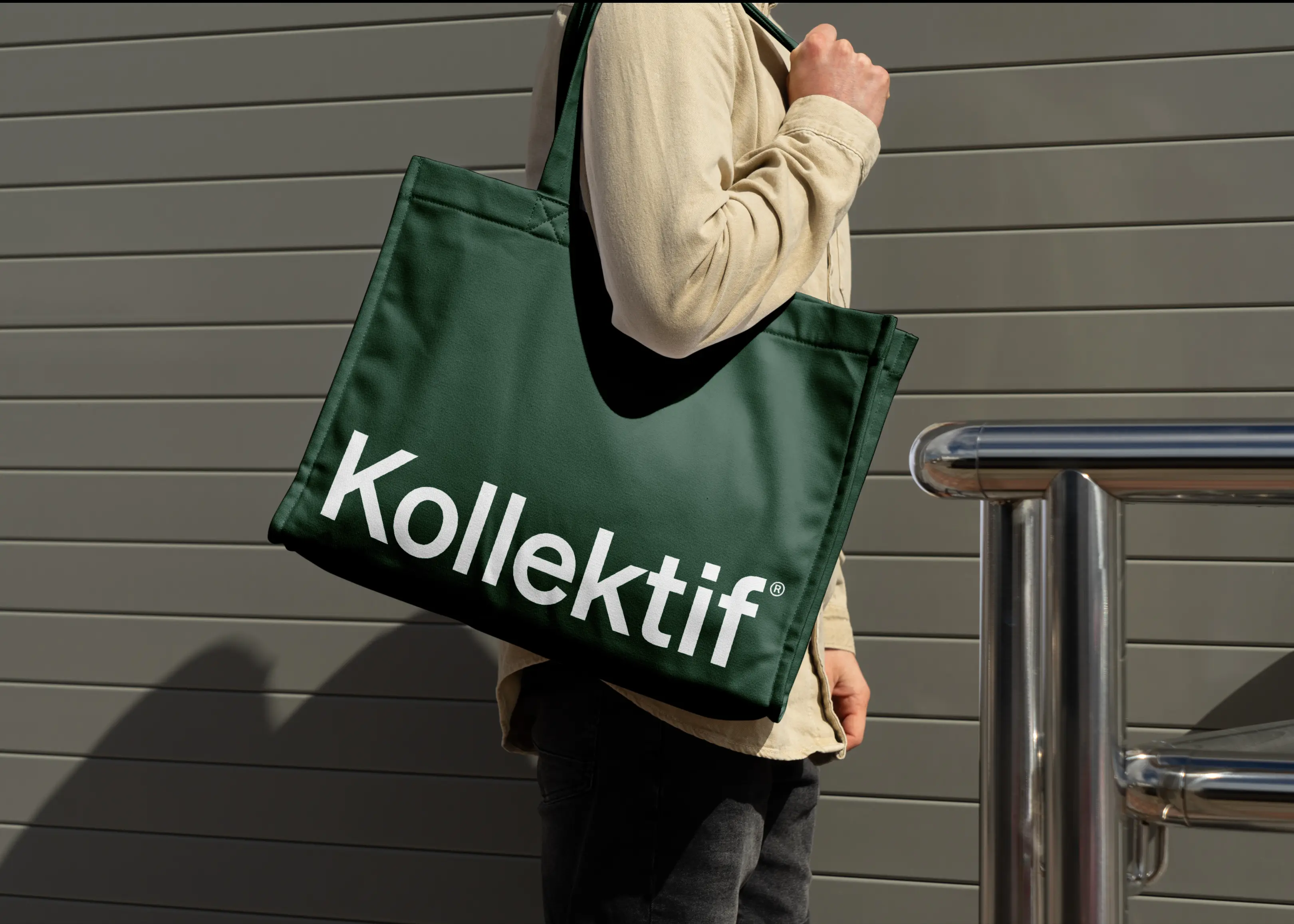person with dark green kollektif tote back over shoulder