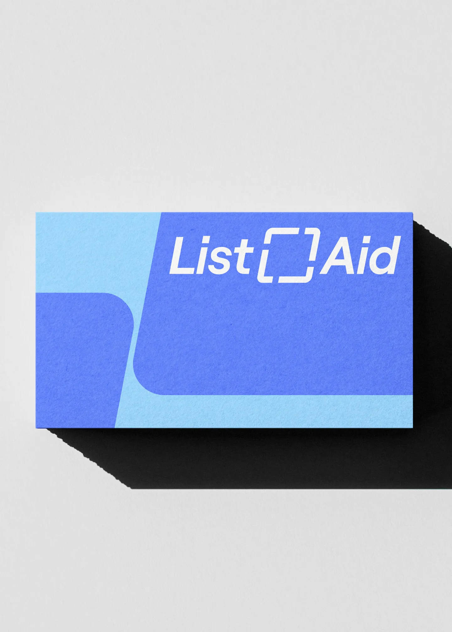 front of listaid business card