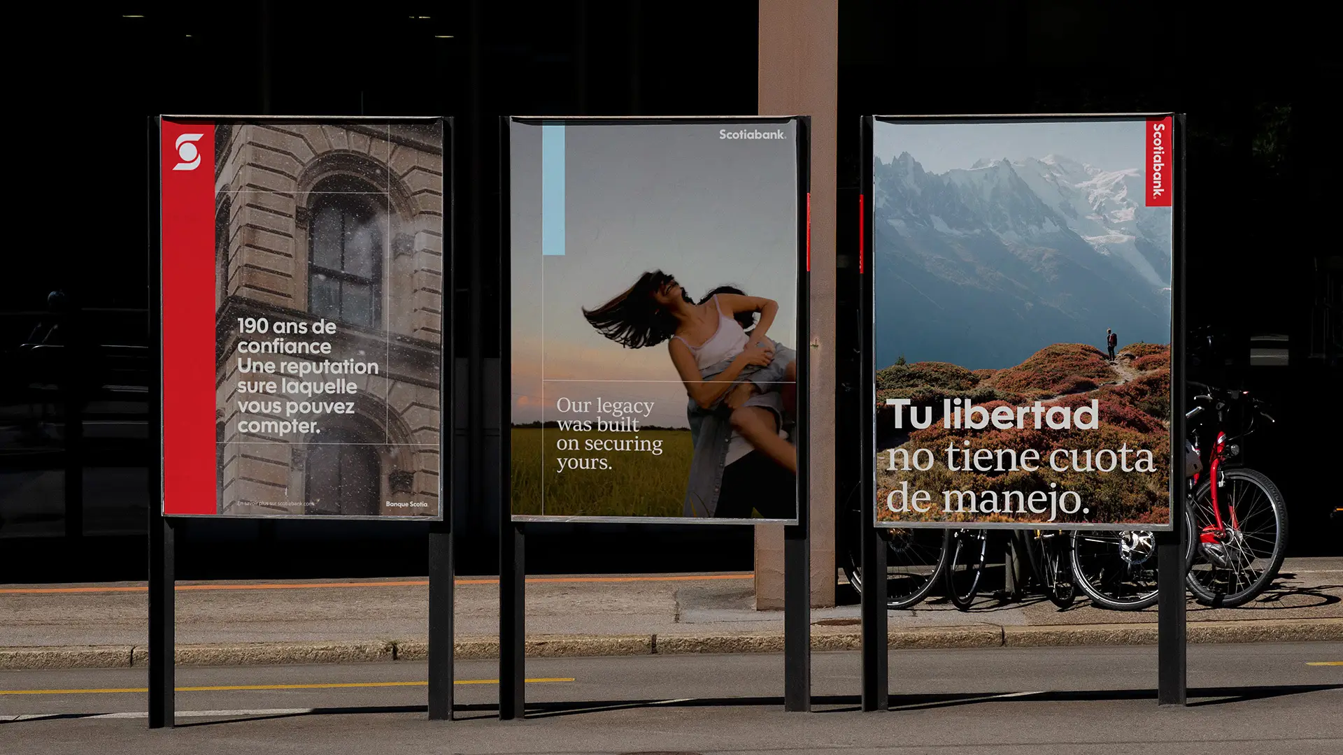 three posters outdoors